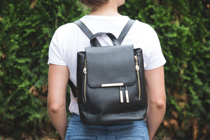 woman backpacks